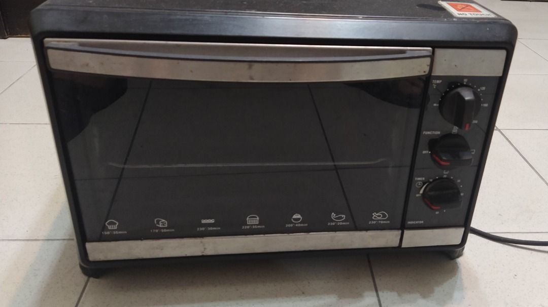 Hanabishi Electric Oven Grill (Category: Ovens & Toasters) located in Cainta. Submitted by sannypasc (Listing ID 1443437666, Image 1). Description: - Black oven toaster - Versatile cooking functions (indicated by icons) - Adjustable temperature and timer controls - Ideal for baking, toasting, and more - Ready for a new home.