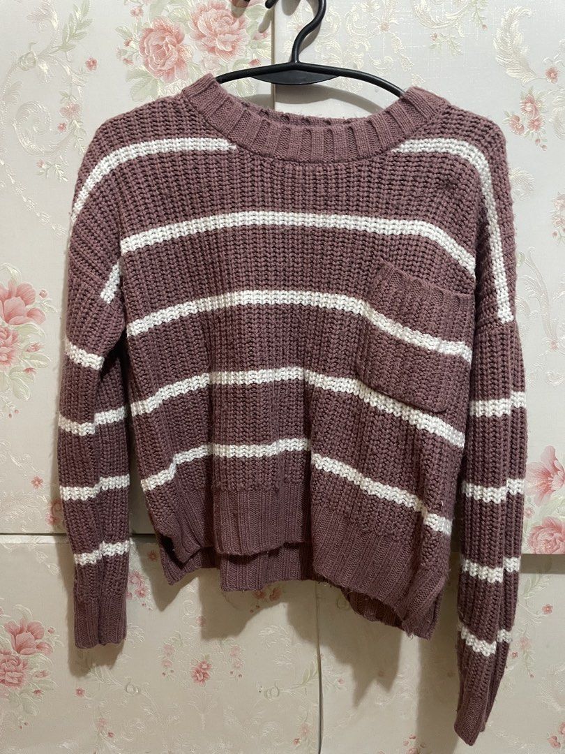 Hippie Rose Striped Knit Sweater (Category: Longsleeves) located in Paranaque City. Submitted by annchang0 (Listing ID 1443492552, Image 1). Description: - Mauve and white striped knit sweater - Long sleeves - Crew neck - Small pocket on left chest - Cropped length - Cozy and casual style - Ideal for layering or wearing alone.