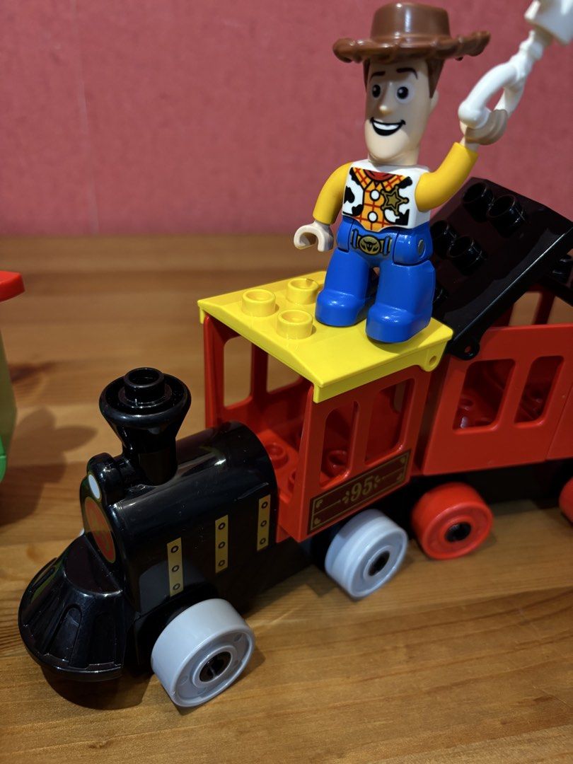 LEGO DUPLO Toy Story Train Set (Category: Lego & Building Sets) located in Paranaque City. Submitted by avec21 (Listing ID 1443406429, Image 3). Description: - LEGO DUPLO Toy Story Train Set - Includes Woody and Buzz Lightyear figures - Comes with a wanted poster and extra bricks - Ideal for young fans of Toy Story - All pieces shown in photos are included - Great for fun playtime.
