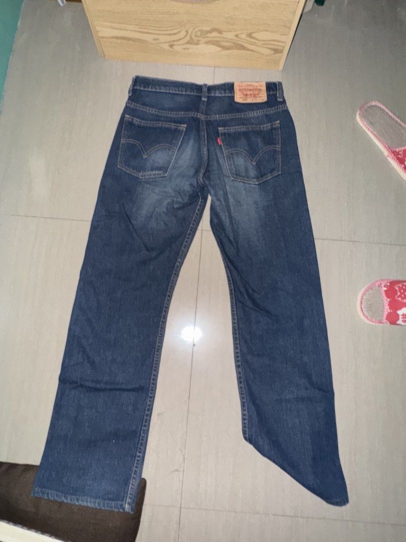Levi's 523 Jeans W30 L33 (Category: Jeans) located in Navotas City. Submitted by eggsyyyyyyyyy (Listing ID 1443491097, Image 2). Description: - Classic Levi's 523 Jeans - Dark Wash Denim - Straight Leg Fit - Size: Waist 30, Length 33 - Button Fly Closure - Two Back Pockets with Signature Stitching - Iconic Red Tab Logo - Ideal for Everyday Wear.