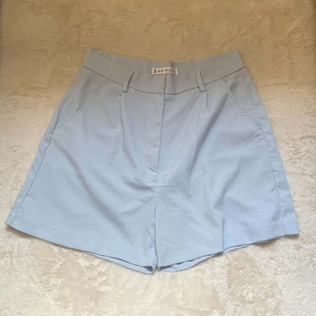Light Blue High Waisted Shorts (Category: Shorts) located in Quezon City. Submitted by declutterwithnic (Listing ID 1443445654, Image 1). Description: - Light blue shorts from AMISU - High-waisted style - Button and zip closure - Two front pockets - Simple and classic design - Perfect for casual wear - Size 40.