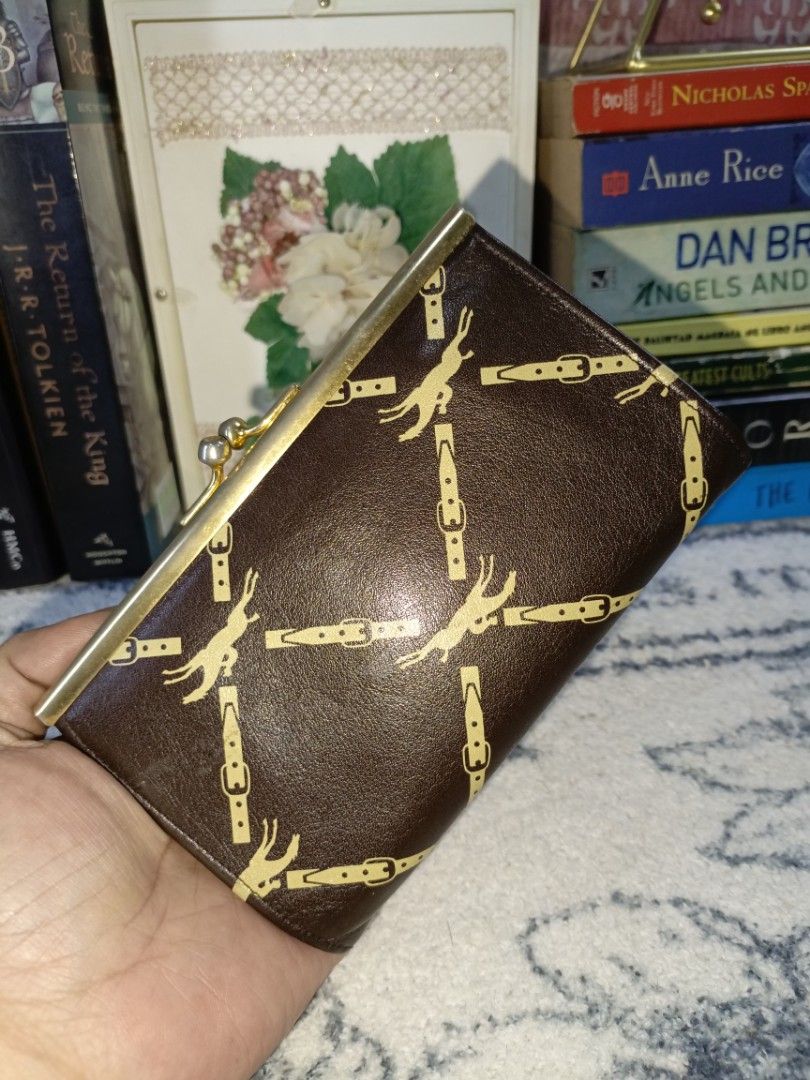 M: Longchamp Vintage Kisslock (Category: Luxury Bags & Wallets) located in San Pedro. Submitted by elevens_online_thrift_shop (Listing ID 1443461511, Image 2). Description: Signature longchamp horse belt genuine leather signs of usage sa hardware leather is in good condition.