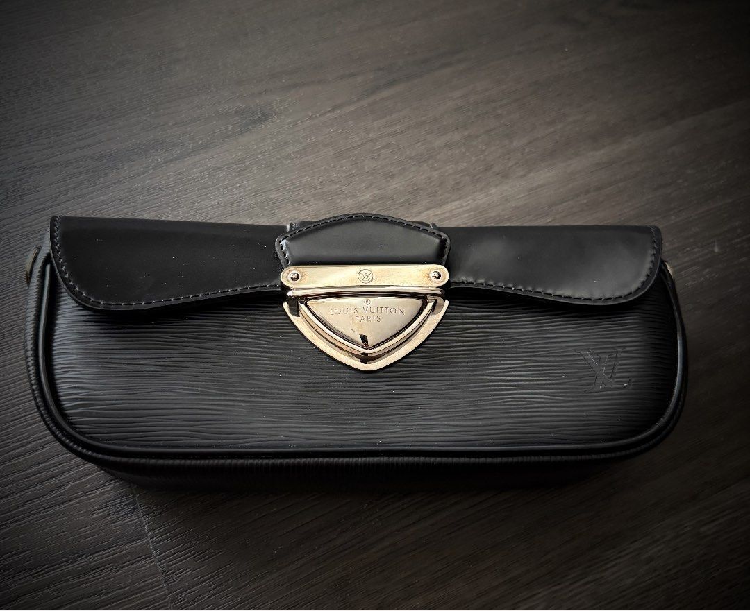 Louis Vuitton Black Clutch Bag with Strap (Category: Luxury Bags & Wallets) located in Pasig City. Submitted by closet_finds1 (Listing ID 1443357401, Image 1). Description: Louis Vuitton clutch in black Epi leather. Features silver hardware and a detachable strap Purchased in Japan No box included Price negotiable.