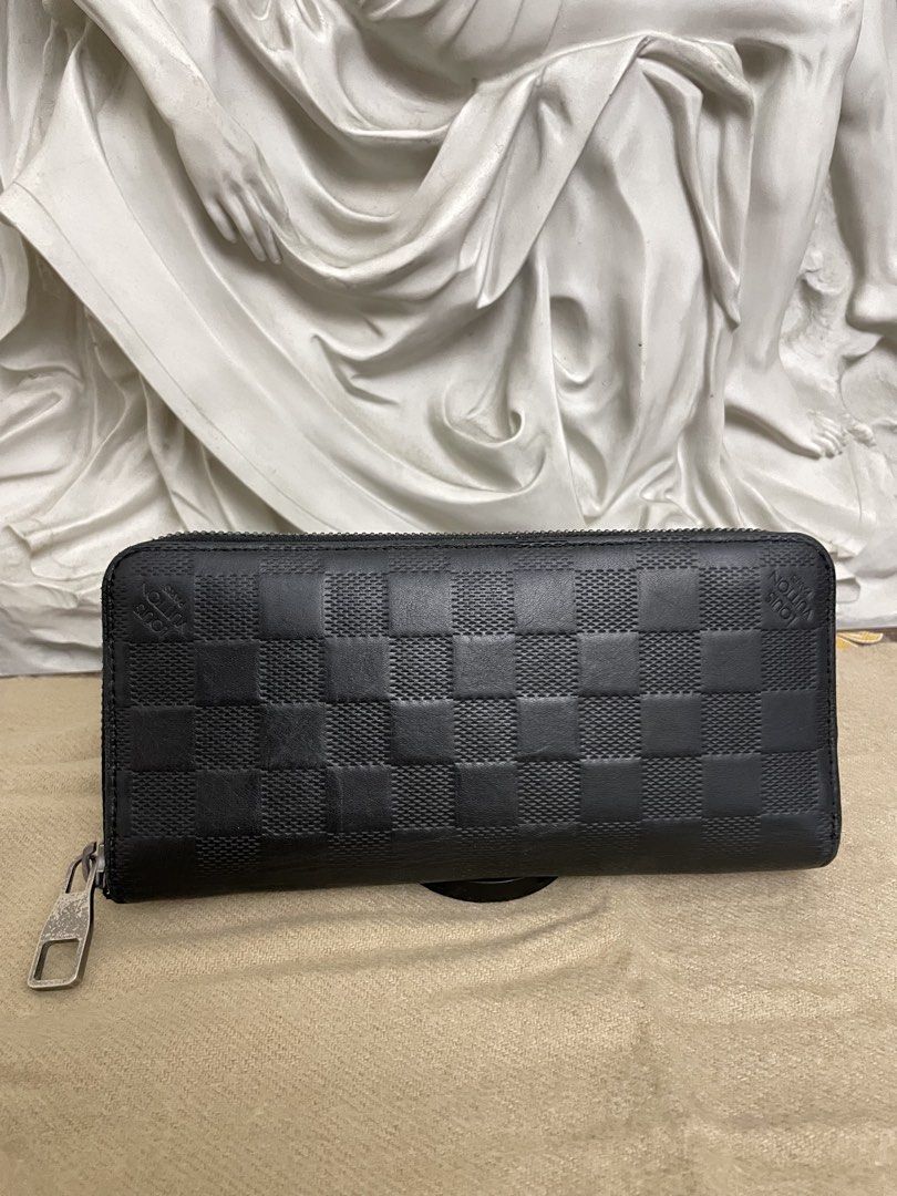 Clearance⬇️Louis Vuitton Damier infini long zippy wallet (Category: Wallets & Card Holders) located in Cagayan de Oro. Submitted by borseamore (Listing ID 1443411849, Image 1). Description: Authentic 💯✅ Rank AB to B. Has signs of use but overall still in good shape. Interior all intact, lining intact, Not sticky no bakbak, not pwdery no cracks. Exterior has rubs & Scratches, Corner rubber lining flaws. Overall still intact And good condition. Pr
