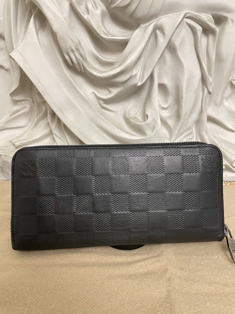 Clearance⬇️Louis Vuitton Damier infini long zippy wallet (Category: Wallets & Card Holders) located in Cagayan de Oro. Submitted by borseamore (Listing ID 1443411849, Image 3). Description: Authentic 💯✅ Rank AB to B. Has signs of use but overall still in good shape. Interior all intact, lining intact, Not sticky no bakbak, not pwdery no cracks. Exterior has rubs & Scratches, Corner rubber lining flaws. Overall still intact And good condition. Pr