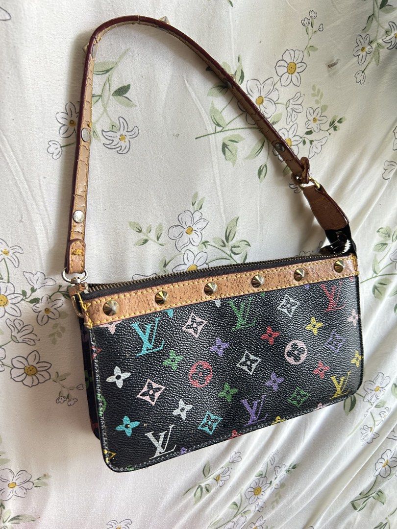 Louis Vuitton Monogram Multicolore Pochette Accessoires (Category: Luxury Bags & Wallets) located in Manila. Submitted by angelsnoow (Listing ID 1443352402, Image 2). Description: - Authentic Louis Vuitton Pochette - Iconic Monogram Multicolore on black canvas - Leather trim and strap - Gold-tone hardware with studs - Zipper closure - Compact size, perfect for essentials - Strap shows some signs of wear.