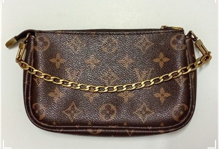 LV Monogram WRISLET🤎 POUCH (Category: Luxury Bags & Wallets) located in Manila. Submitted by eriiicaspage (Listing ID 1443394437, Image 2). Description: PreOwned Lighlt Used Louis Vuitton Monogram Wrislet Pouch Micro Sized - Classic Monogram Canvas - Includes Gold-Tone Chain - Secure Zipper Closure - Clean Interior - Ideal for carrying essentials - Versatile: Use as a clutch or attach to a larger bag No code Good Condition 8.9/10 .