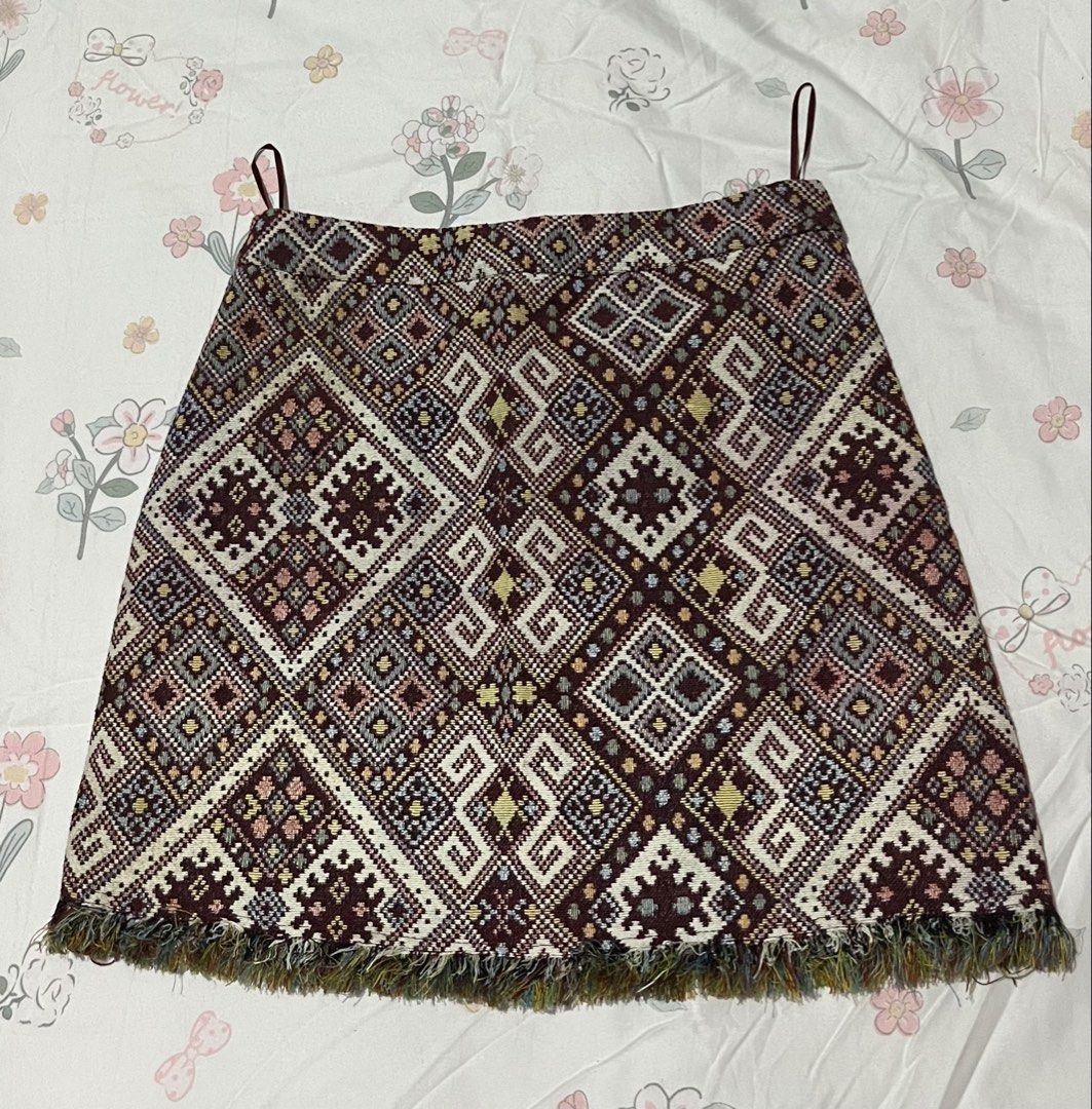 Urban Revivo Maroon tweed skirt ethnic print (Category: Skirts) located in Tarlac. Submitted by heartbeataria (Listing ID 1384828148, Image 1). Description: length: 16" waistline: 26".