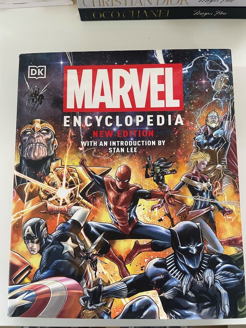 Marvel Encyclopedia New Edition DK Stan Lee Introduction (Category: Comics & Manga) located in Las Pinas. Submitted by strandedonarock (Listing ID 1443364298, Image 1). Description: 💫 Preloved | From personal collection Condition: - Like new - Clean, neat pages - Little to no signs of use - DK Marvel Encyclopedia, New Edition - Definitive guide to the Marvel Universe characters - Features an introduction by Stan Lee - Updated and expanded with n