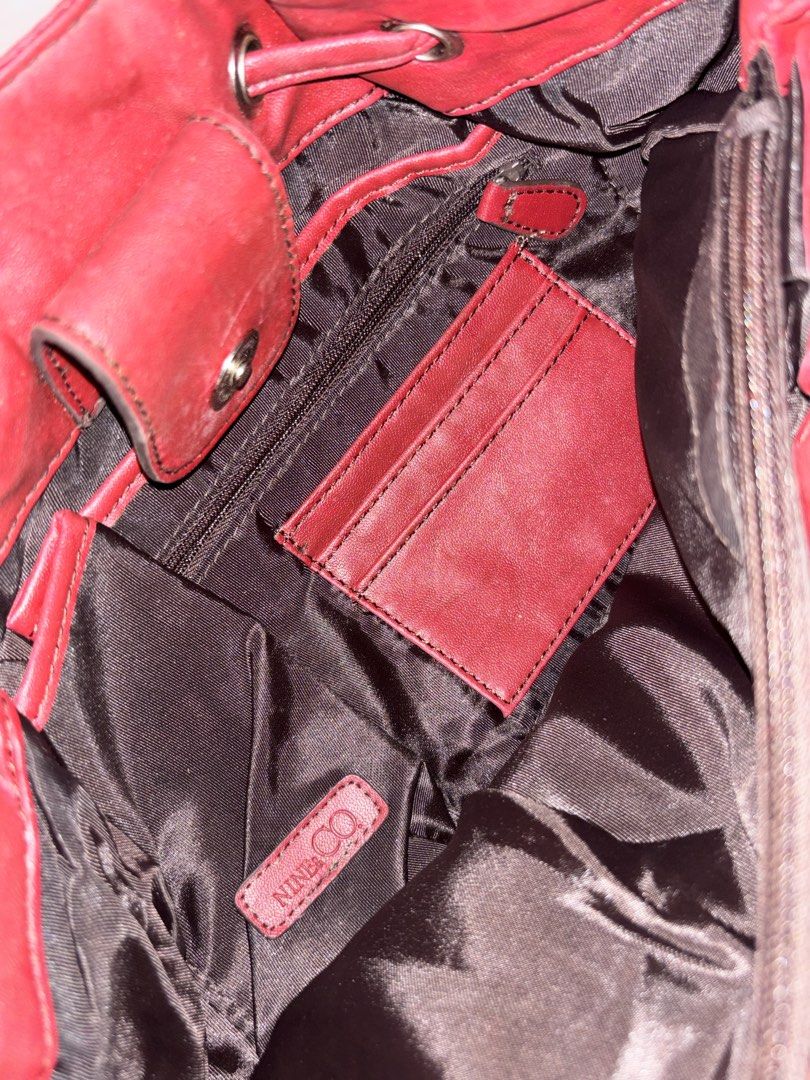 Nine & Co. Medium Sized Red Leather Purse Handbag With Pockets (Category: Shoulder Bags) located in Valenzuela. Submitted by willow.marae (Listing ID 1443384441, Image 3). Description: - has a sign of usage (see the photos) - excellent condition - pretty color and details - all closures are working smoothly L: 9” W: 13” - Our pieces are thoughtfully curated and pre-loved, each carrying its own story and character. Because they’ve lived a life bef