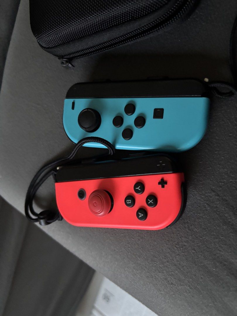 Nintendo Switch Console with Joy-Cons and Case (Category: Nintendo) located in Quezon City. Submitted by archer417 (Listing ID 1443413616, Image 3). Description: - Nintendo Switch Console with dock and charger - 2 Red and 2 Blue Joy-Cons included - Black Carrying Case - Ideal for portable gaming - Feel free to ask questions!.