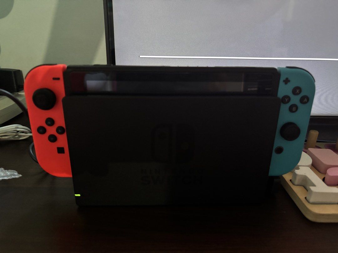 Nintendo Switch Console with Joy-Cons and Case (Category: Nintendo) located in Quezon City. Submitted by archer417 (Listing ID 1443413616, Image 1). Description: - Nintendo Switch Console with dock and charger - 2 Red and 2 Blue Joy-Cons included - Black Carrying Case - Ideal for portable gaming - Feel free to ask questions!.