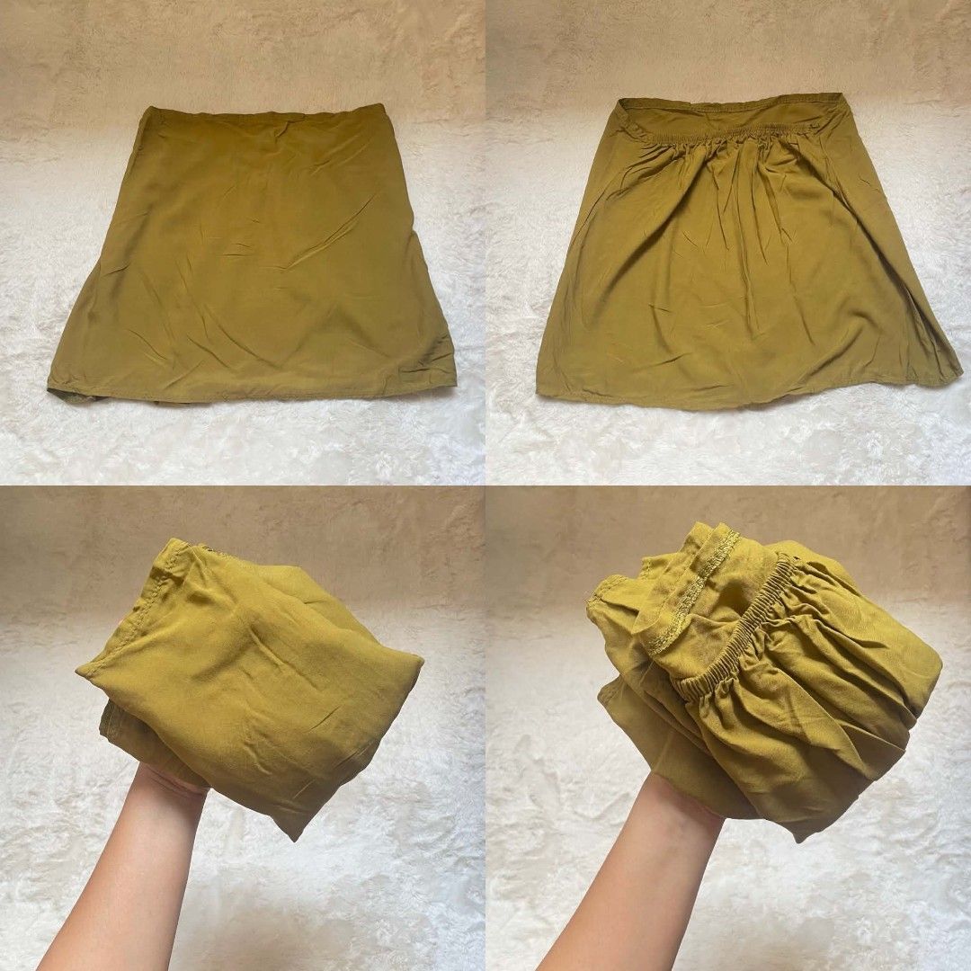 Olive Green Tube top (Category: Others Tops) located in Quezon City. Submitted by declutterwithnic (Listing ID 1443445125, Image 2). Description: - Comfortable elastic waistband - Flowy material for a breezy feel - Ideal for casual outfits - Versatile and easy to style with different tops.