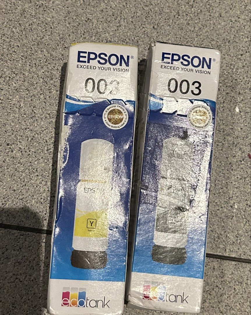 OriginL Epson 003 Ink Bottles (Yellow & Black) (Category: Printers, Scanners & Copiers) located in Del Monte. Submitted by garahestuff (Listing ID 1443456377, Image 1). Description: - Genuine Epson 003 Ink Bottles - Includes 1 Yellow and 1 Black bottle - Compatible with Epson EcoTank printers - Brand new, sealed, and ready for use - Ensure vibrant and reliable prints with authentic Epson ink.