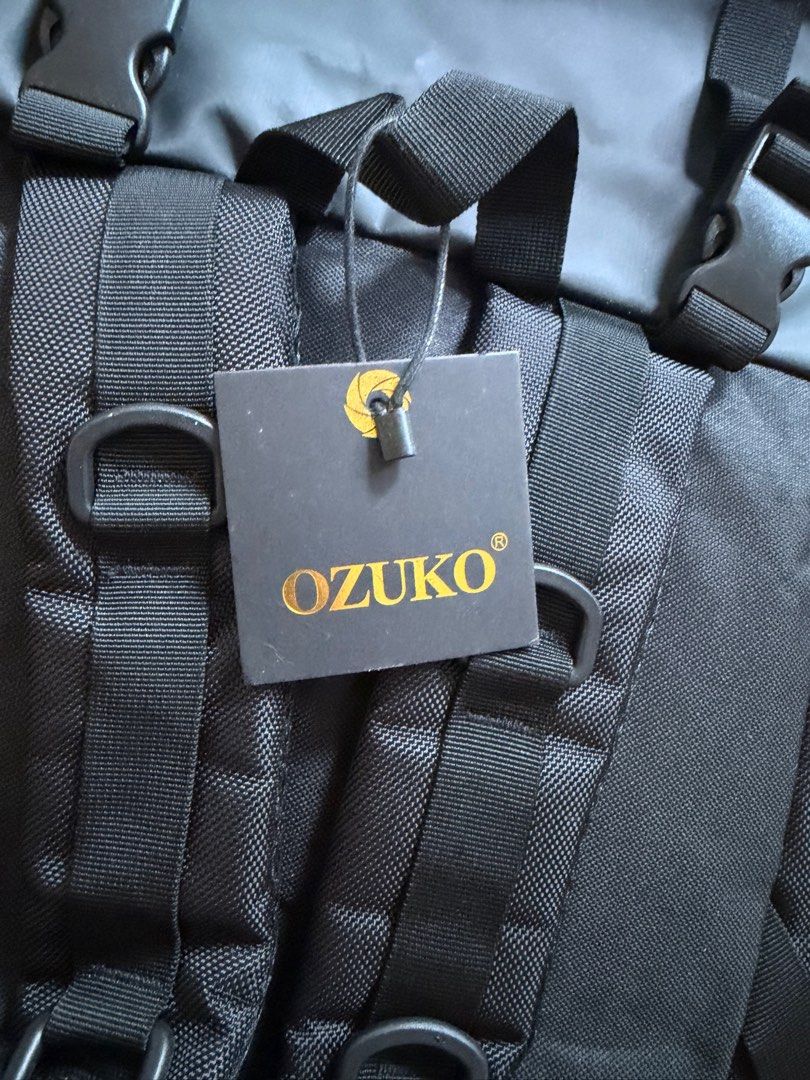OZUKO Black Roll-Top Backpack (Category: Backpacks) located in Pasig City. Submitted by riccimoi (Listing ID 1443327997, Image 3). Description: - Brand: OZUKO - Style: Black Roll-Top Backpack - Features: Spacious interior, multiple front pockets for easy access, adjustable comfort straps, reflective side details - Ideal for: Daily use, travel.