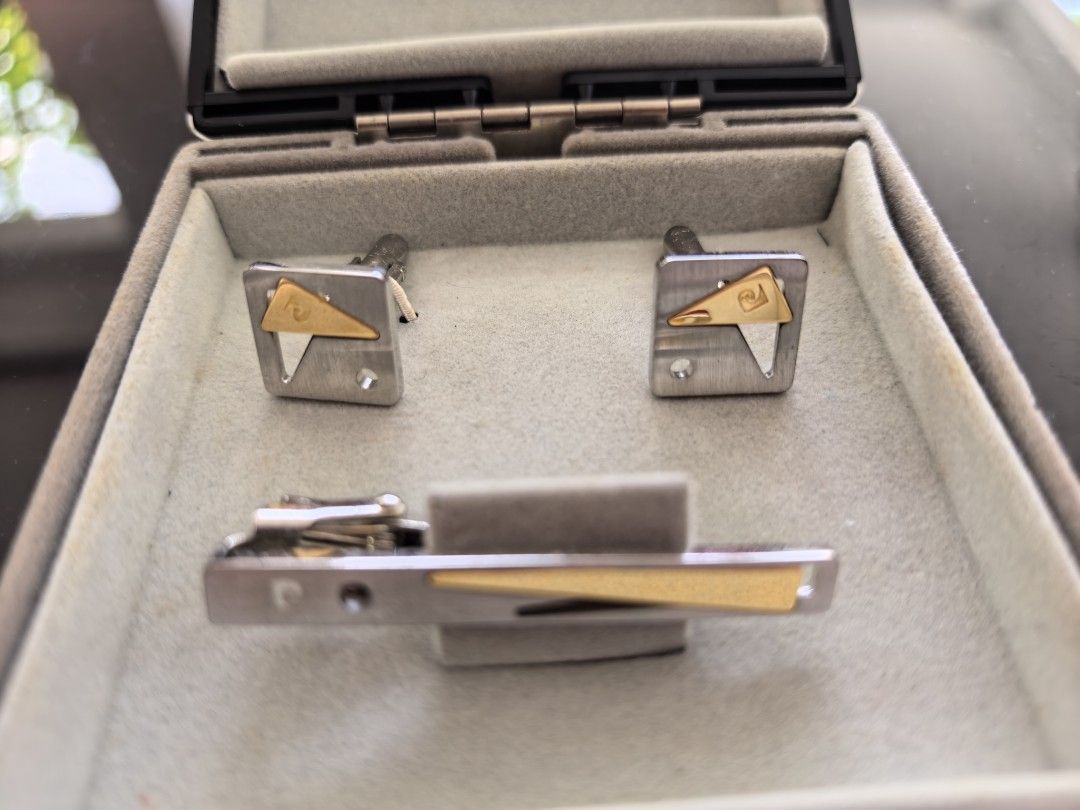 Pierre Cardin Cufflinks and Tie Clip Set (Category: Cuff Links) located in Tuguegarao City. Submitted by seagull2026 (Listing ID 1443326492, Image 3). Description: - Authentic Pierre Cardin accessory set - Silver tone with elegant gold accents - Includes original Pierre Cardin box - Ideal for formal wear and completing suits - A timeless and classic addition to any wardrobe.