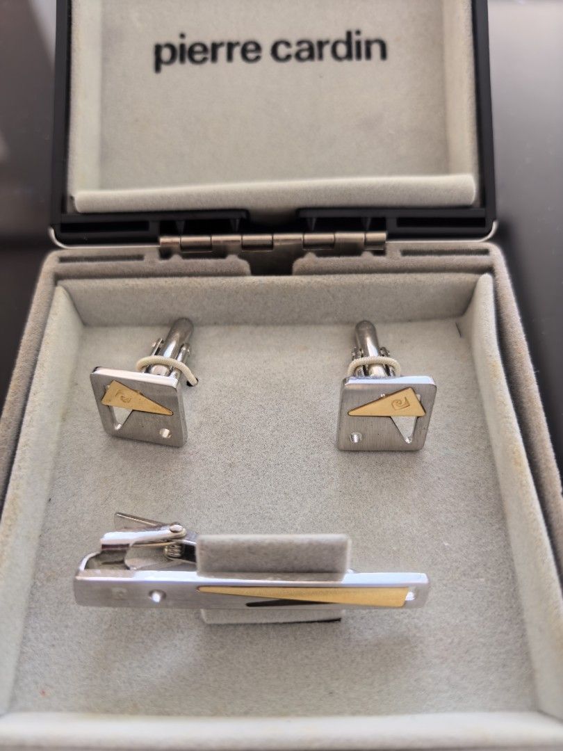 Pierre Cardin Cufflinks and Tie Clip Set (Category: Cuff Links) located in Tuguegarao City. Submitted by seagull2026 (Listing ID 1443326492, Image 2). Description: - Authentic Pierre Cardin accessory set - Silver tone with elegant gold accents - Includes original Pierre Cardin box - Ideal for formal wear and completing suits - A timeless and classic addition to any wardrobe.