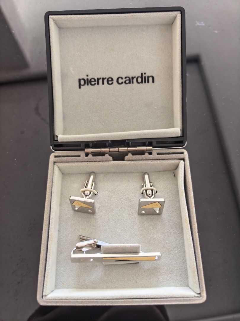 Pierre Cardin Cufflinks and Tie Clip Set (Category: Cuff Links) located in Tuguegarao City. Submitted by seagull2026 (Listing ID 1443326492, Image 1). Description: - Authentic Pierre Cardin accessory set - Silver tone with elegant gold accents - Includes original Pierre Cardin box - Ideal for formal wear and completing suits - A timeless and classic addition to any wardrobe.