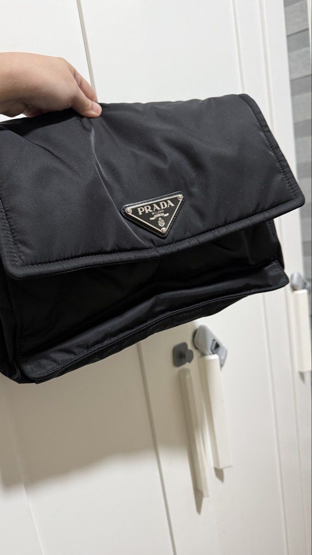Prada Black Nylon Traveller Bag (Category: Luxury Bags & Wallets) located in Manila. Submitted by authenticprelovedbyjkc (Listing ID 1443347442, Image 1). Description: - SRP 150k+ Authentic Black Prada Shoulder Bag - Durable Nylon Material - Secure Flap Closure with Snap Button - Interior Zippered Compartment - Interior Slip Pocket - Genuine Leather Strap - Ideal for Everyday Use.