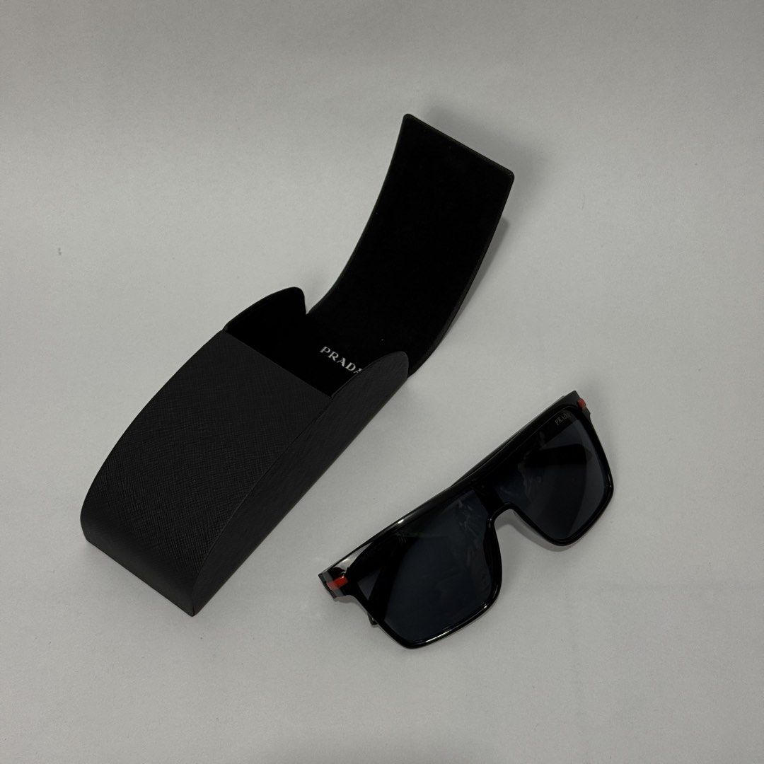 PRADA SUNGLASSES (Category: Luxury Accessories) located in Dagupan City. Submitted by armoirelux (Listing ID 1443447676, Image 1). Description: Comes with box.