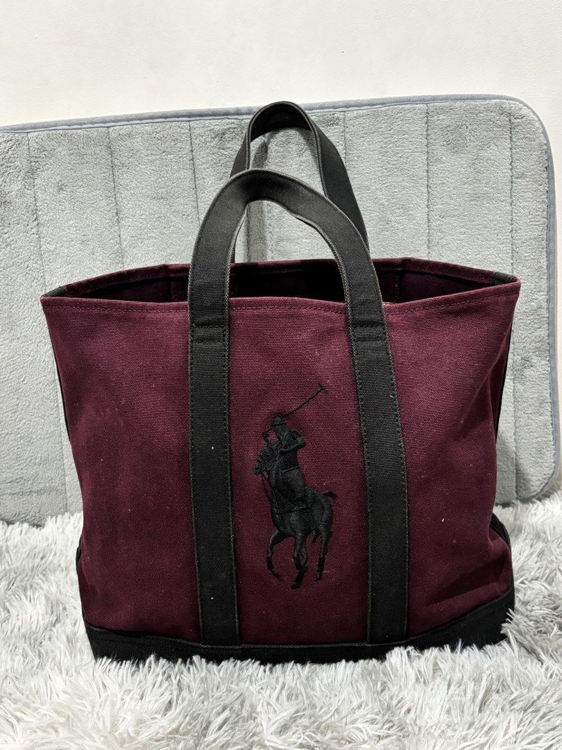 Ralph Lauren Canvas Tote Bag (Category: Luxury Bags & Wallets) located in Muntinlupa City. Submitted by luxurybagprince1 (Listing ID 1443412711, Image 1). Description: Authentic Ralph Lauren tote bag Maroon No flaws Cleaning neeeed .