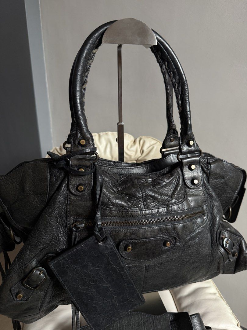 SOLD Rare Balenciaga Part Time (Category: Luxury Bags & Wallets) located in Bacoor. Submitted by mikaysu (Listing ID 1443423402, Image 2). Description: - The bag itself is in pristine condition, just a minor flaw on the mirror can be easily replaced or restored. - Hard to source and highly sought for - With COA from B101 - Comes with strap, mirror, and generic dust bag.