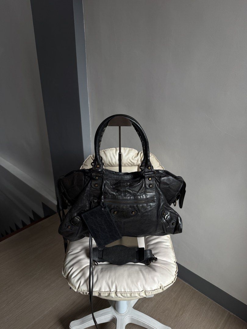 SOLD Rare Balenciaga Part Time (Category: Luxury Bags & Wallets) located in Bacoor. Submitted by mikaysu (Listing ID 1443423402, Image 1). Description: - The bag itself is in pristine condition, just a minor flaw on the mirror can be easily replaced or restored. - Hard to source and highly sought for - With COA from B101 - Comes with strap, mirror, and generic dust bag.
