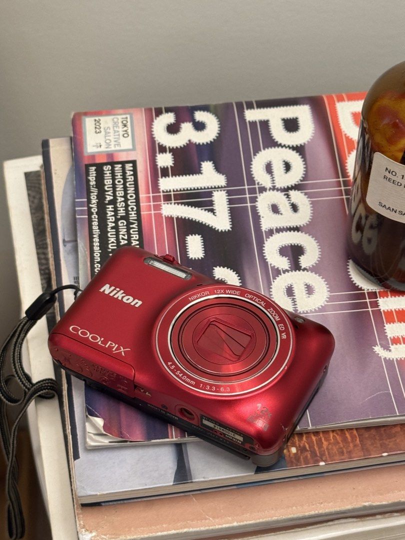 RARE Nikon Coolpix S6600 Digital Camera (Flip Screen) (Category: Cameras) located in Manila. Submitted by doremicarteu (Listing ID 1443345722, Image 1). Description: every girl’s wishlist ⋆౨ৎ˚⟡˖ ࣪ ✷ Nikon Coolpix S6600 ✷ ⤷ fully functional (flip screen) / no issues ⤷ vintage output (10/10 cosmetics) ⤷ the it girl cam 💐 ⤷ complete inclusion : cam, battery, charger, wrist strap, camera bag, box, manuals dm for more info and sample shots ◡̈.