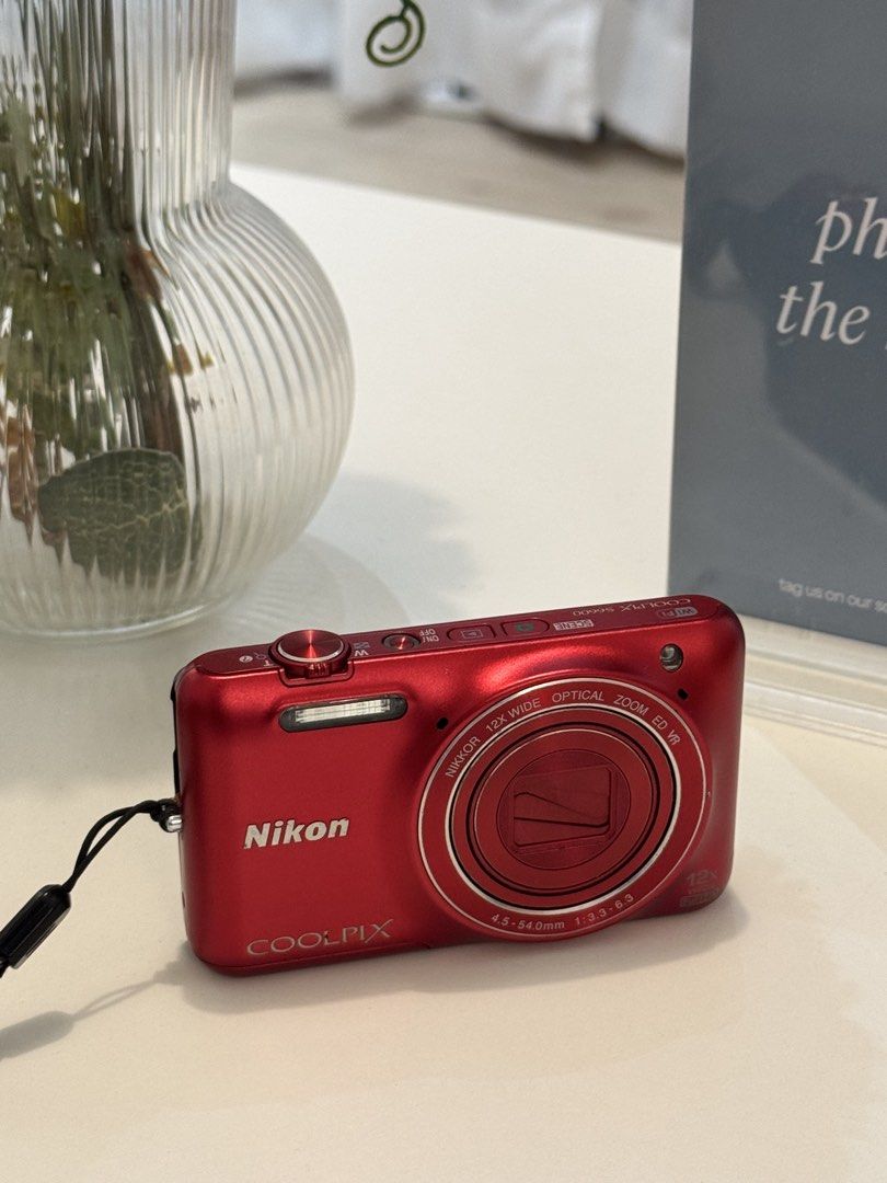 RARE Nikon Coolpix S6600 Digital Camera (Flip Screen) (Category: Cameras) located in Manila. Submitted by doremicarteu (Listing ID 1443345722, Image 3). Description: every girl’s wishlist ⋆౨ৎ˚⟡˖ ࣪ ✷ Nikon Coolpix S6600 ✷ ⤷ fully functional (flip screen) / no issues ⤷ vintage output (10/10 cosmetics) ⤷ the it girl cam 💐 ⤷ complete inclusion : cam, battery, charger, wrist strap, camera bag, box, manuals dm for more info and sample shots ◡̈.