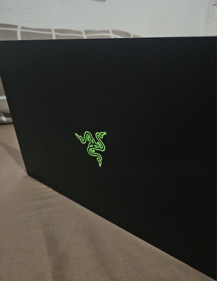 RazerBlade 15 2022 (Category: Laptops & Notebooks) located in Tuguegarao City. Submitted by erika_ja (Listing ID 1443406751, Image 3). Description: RazerBlade 15 2022 12th Gen Core i7 Processor (14-core) i7-12800H Intel Iris Xe Graphics Nvidia Geforce RTX 3060 6gb Graphics 16gb DDR5 4800MHz RAM (upgradeable) 512gb SSD NVME (upgradeable) 15.6in IPS QHD 240Hz Display CNC Aluminum Chasis Illuminated Razer Logo Backlit RGB Synapse-ready keyboard Meet