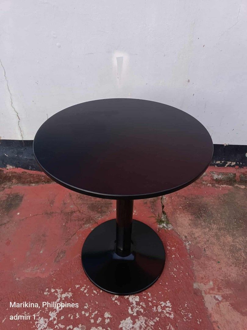 Round/Square Cafe Table - Black or White (Category: Tables & Sets) located in Manila. Submitted by mightycloud_1992 (Listing ID 1443356627, Image 1). Description: - Versatile cafe tables: Round or square tops available. - Color options: Choose from classic black or clean white for both top and base. - Sturdy construction: Features a durable pedestal base for stability. - Ideal for various settings: Perfect for cafes, bistros, restaurants, or even