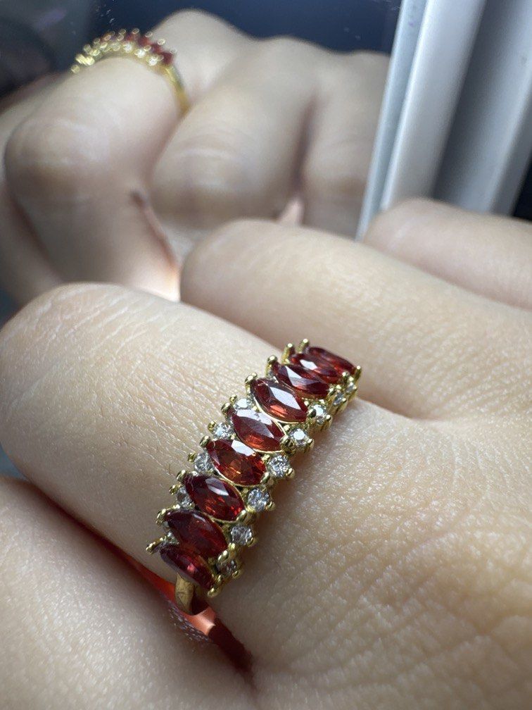 S925 FANTA garnet marquise ring adjustable (Category: Rings) located in Pasig City. Submitted by kleankloset (Listing ID 1443331190, Image 3). Description: ✨ Fanta Garnet Marquise Band Ring ✨ A fiery statement piece for the bold jewelry lover. This elegant band features rich reddish-orange Fanta Garnets in a marquise cut, accented by sparkling clear stones and set in warm gold-plated sterling silver. Fanta Garnet is a trade name often used for vi