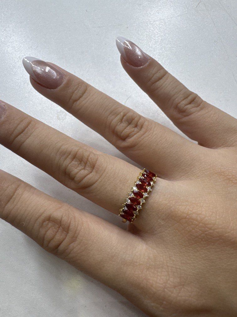S925 FANTA garnet marquise ring adjustable (Category: Rings) located in Pasig City. Submitted by kleankloset (Listing ID 1443331190, Image 2). Description: ✨ Fanta Garnet Marquise Band Ring ✨ A fiery statement piece for the bold jewelry lover. This elegant band features rich reddish-orange Fanta Garnets in a marquise cut, accented by sparkling clear stones and set in warm gold-plated sterling silver. Fanta Garnet is a trade name often used for vi