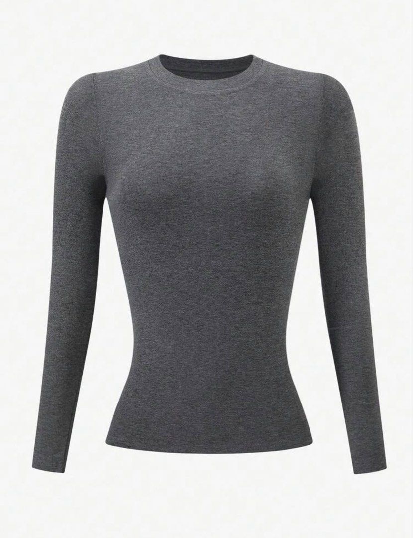 SHEIN Dark Grey Long Sleeve Top (Category: Longsleeves) located in Mandaluyong City. Submitted by annestuffing (Listing ID 1443352597, Image 2). Description: - Basic dark grey long sleeve top - Padded shoulders - Crew neck and fitted style - Comfortable and stretchy material - Versatile for layering or wearing on its own - Available in Medium and XL sizes.