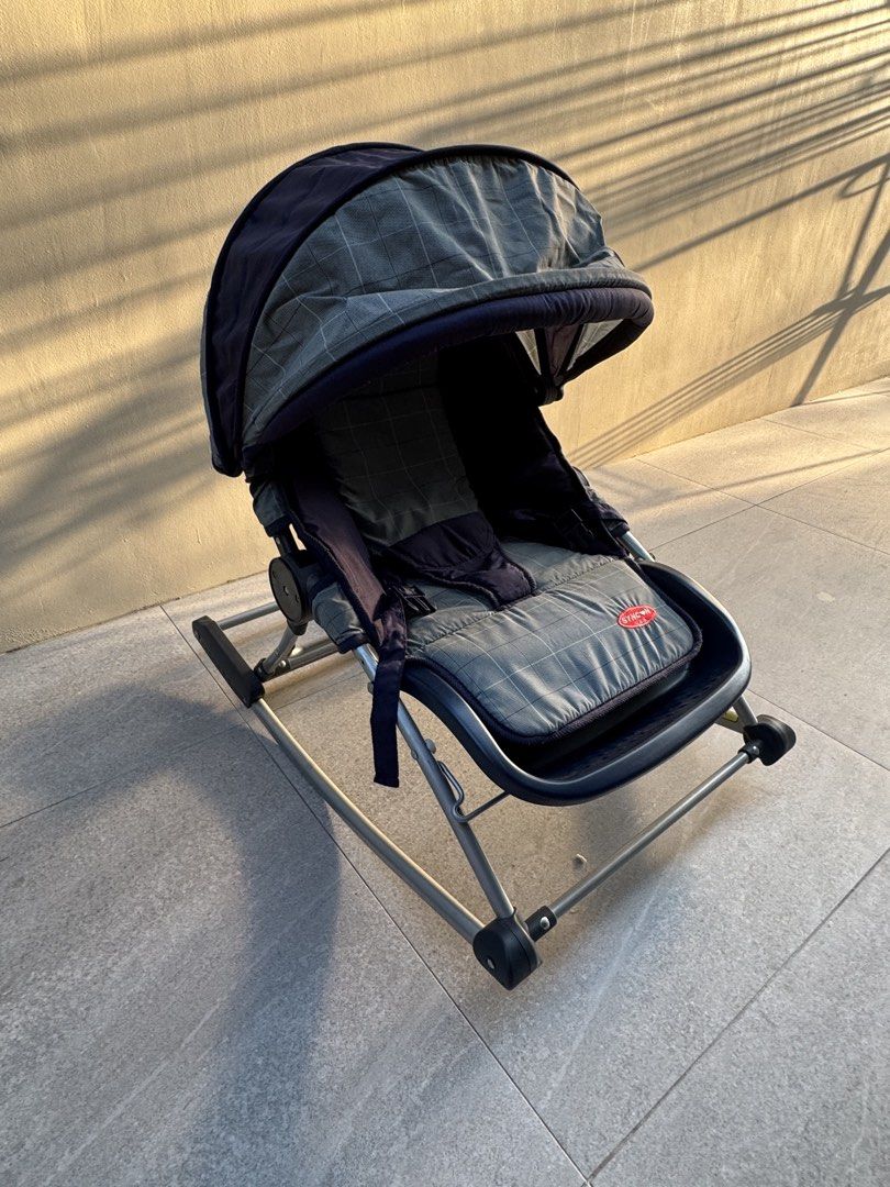 Syncon Baby Rocker with Canopy and Harness (Category: Other Kids Furniture) located in Las Pinas. Submitted by vanethneth (Listing ID 1443421449, Image 3). Description: - Used Syncon baby rocker - Includes canopy for sun protection - Seat reclines for comfort - Durable metal frame - Ideal for keeping baby entertained or for naps - Minor signs of wear, but in good working condition.