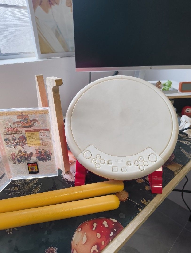 Taiko no Tatsujin Drums & Game Set (Category: Nintendo) located in Caloocan City. Submitted by cowrator (Listing ID 1443379277, Image 2). Description: - Nintendo Switch Taiko no Tatsujin Rhythmic Adventure Pack - Includes both Rhythmic Adventure 1 and 2 - Comes with the official drum controller and drumsticks - Ideal for fans of rhythm games.