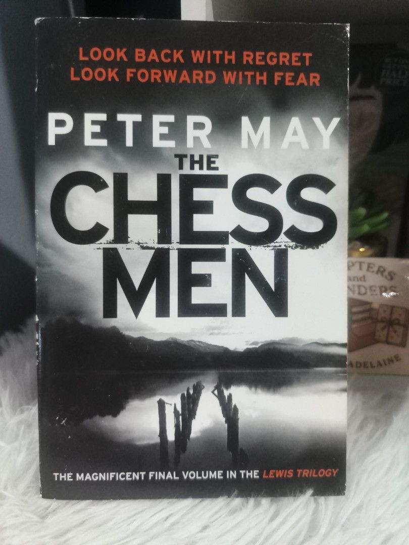 The Chess Men by Peter May - Lewis Trilogy Final Volume (Category: Storybooks) located in Cabuyao City. Submitted by chaptersandwonders143 (Listing ID 1443452928, Image 1). Description: - The Chess Men: The final book in Peter May's acclaimed Lewis Trilogy. - Genre: Crime Novel - Plot: Features former detective Fin Macleod investigating a disappearance. - Critical Acclaim: Praised by The Guardian and Independent as a top crime series. - Exciting 