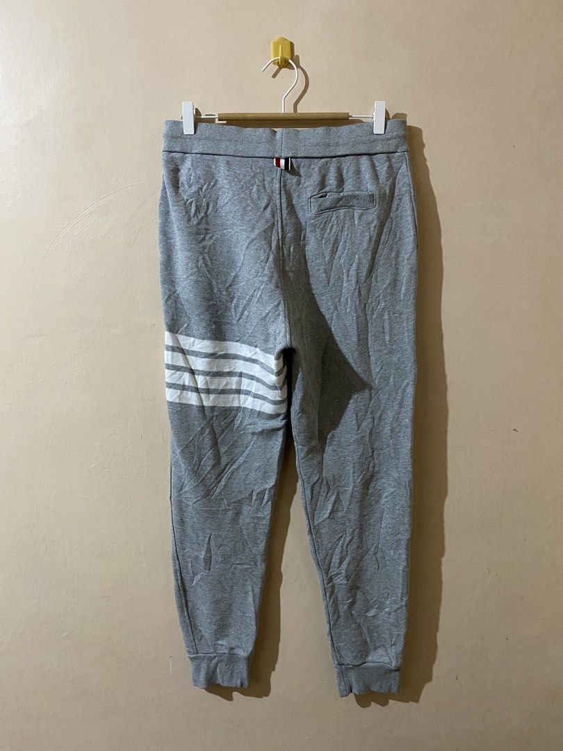 Thom Browne Four-Bar Stripe Cotton Sweat Pants (Category: Joggers) located in Naga. Submitted by trashfinds (Listing ID 1443470695, Image 3). Description: Size: 2 on tag Actual measure waistline: 15.5” Length: 38” Hem: 5” Rise: 12.5” Color rate: 9/10 Issue: none.