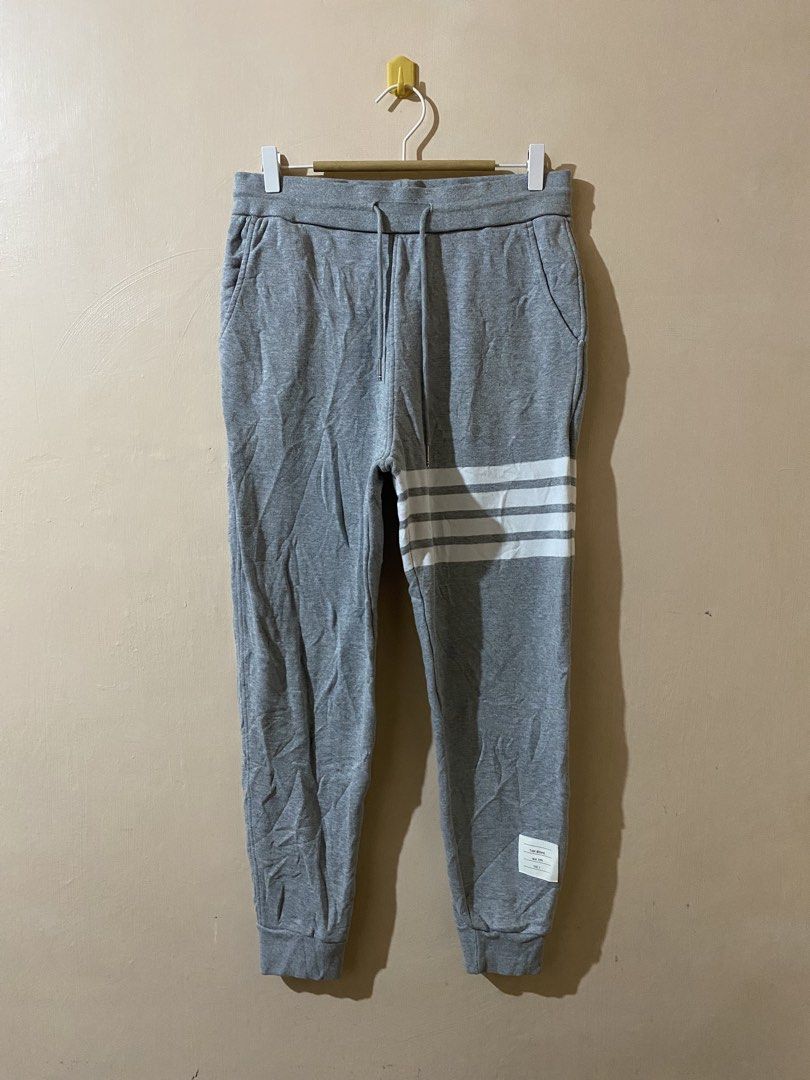 Thom Browne Four-Bar Stripe Cotton Sweat Pants (Category: Joggers) located in Naga. Submitted by trashfinds (Listing ID 1443470695, Image 2). Description: Size: 2 on tag Actual measure waistline: 15.5” Length: 38” Hem: 5” Rise: 12.5” Color rate: 9/10 Issue: none.