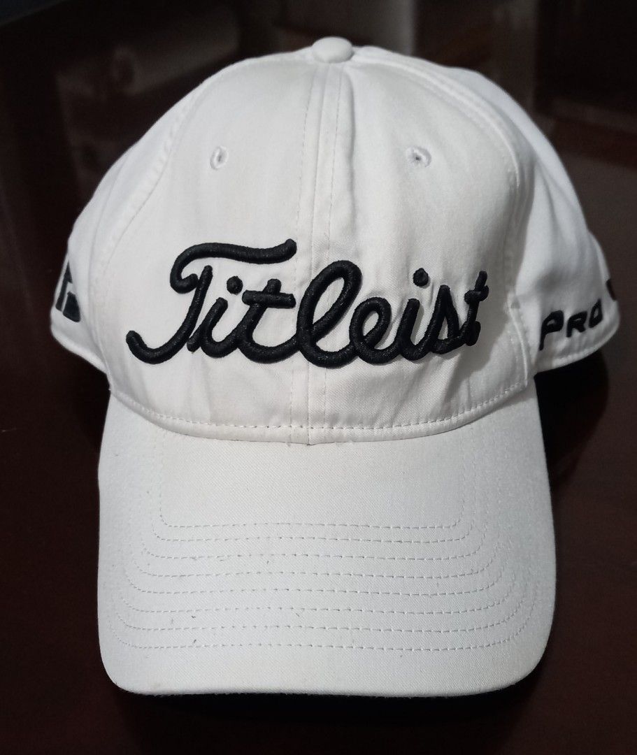 Titleist Pro V1 Golf Cap White (Category: Caps & Hats) located in Cagayan de Oro. Submitted by edwardryan01984 (Listing ID 1443447688, Image 1). Description: - Classic white Titleist Pro V1 cap - Features embroidered Titleist script logo on front - FJ logo detail on the side - Adjustable strap for a custom, comfortable fit - Ideal for sunny days and golf rounds.