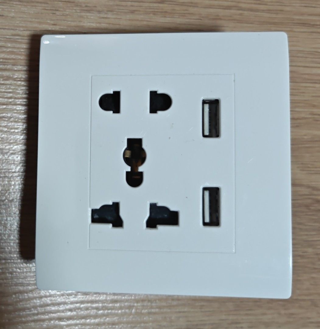 Universal Socket (Category: Electrical, Adaptors & Sockets) located in Singapore. Submitted by luckydog.10e4b5 (Listing ID 1443443939, Image 1). Description: With 2 USB ports output 5V 2A..