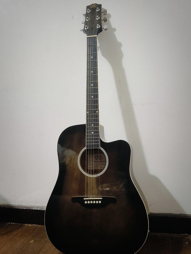 Vintage [Custom] SX Dreadnought (Category: Musical Instruments) located in Marikina City. Submitted by jamvg (Listing ID 1443376234, Image 1). Description: Used in the 1990s -Bone nut -Arched back -Fully working electronics [passive] Issues: cracked nut, loose tuning machine RFS: I want to upgrade to a new acoustic. *Negotiable price No paint/finish issues, no scratches, only dust and dirt on the frets & tuning pegs. MEET UP: Riverbanks, or anywh