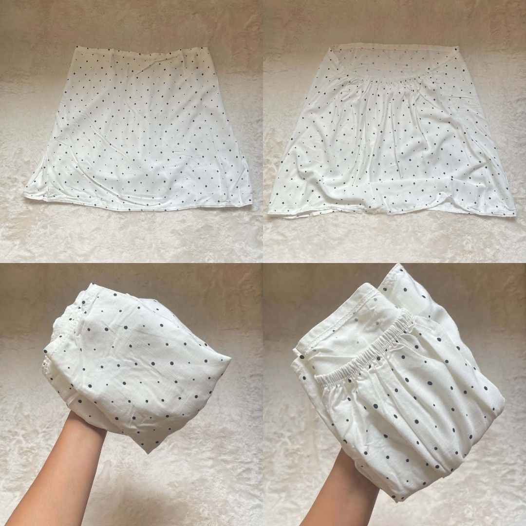 White Polka Dot Tube top (Category: Others Tops) located in Quezon City. Submitted by declutterwithnic (Listing ID 1443444954, Image 2). Description: - Comfortable elastic waistband - Made from lightweight fabric, perfect for warm weather - Versatile piece for casual everyday wear - Easily pairs with various tops for different looks.