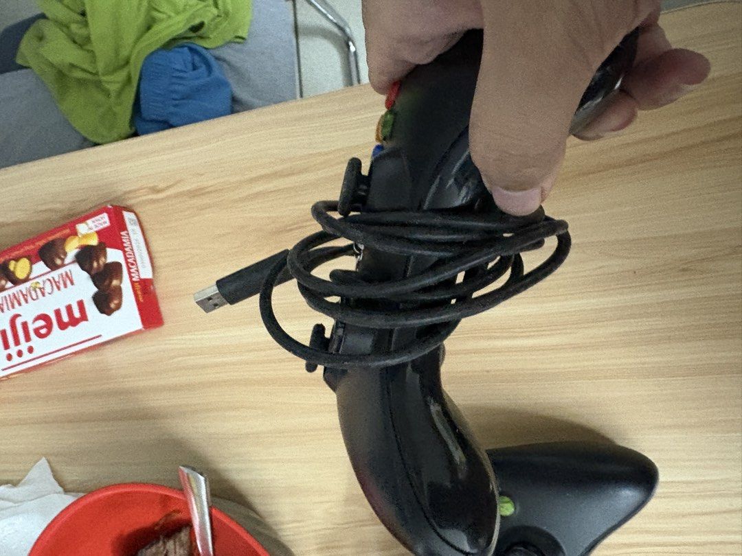 Wired Black Xbox 360 Controller (Category: Controllers) located in Caloocan City. Submitted by Limsoc (Listing ID 1443442662, Image 3). Description: Not sure if it still works.