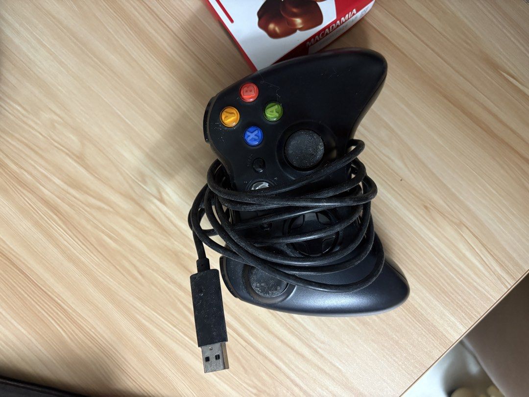 Wired Black Xbox 360 Controller (Category: Controllers) located in Caloocan City. Submitted by Limsoc (Listing ID 1443442662, Image 1). Description: Not sure if it still works.