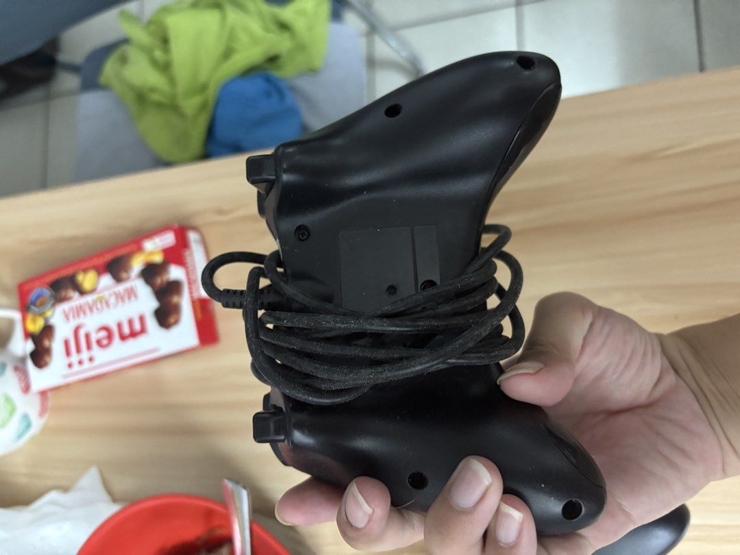 Wired Black Xbox 360 Controller (Category: Controllers) located in Caloocan City. Submitted by Limsoc (Listing ID 1443442662, Image 2). Description: Not sure if it still works.
