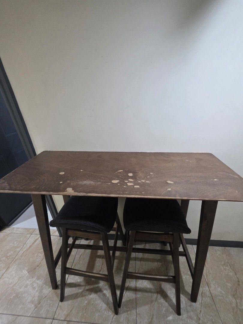 Wooden bar table and chairs (Category: Tables & Sets) located in Makati City. Submitted by crizanned56378 (Listing ID 1443359613, Image 2). Description: used bar table with 2 chairs.