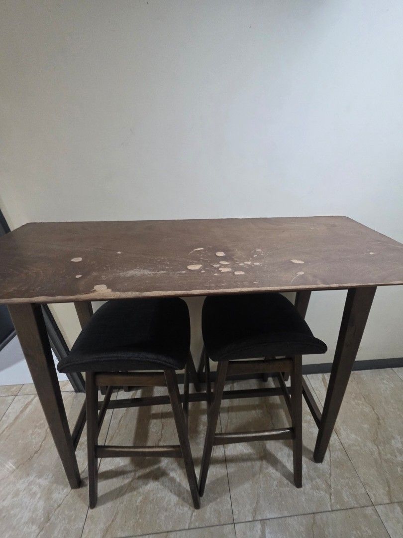 Wooden bar table and chairs (Category: Tables & Sets) located in Makati City. Submitted by crizanned56378 (Listing ID 1443359613, Image 3). Description: used bar table with 2 chairs.