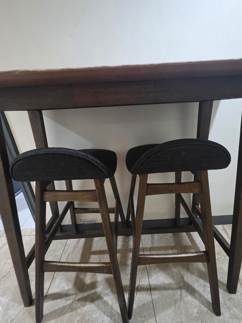 Wooden bar table and chairs (Category: Tables & Sets) located in Makati City. Submitted by crizanned56378 (Listing ID 1443359613, Image 1). Description: used bar table with 2 chairs.