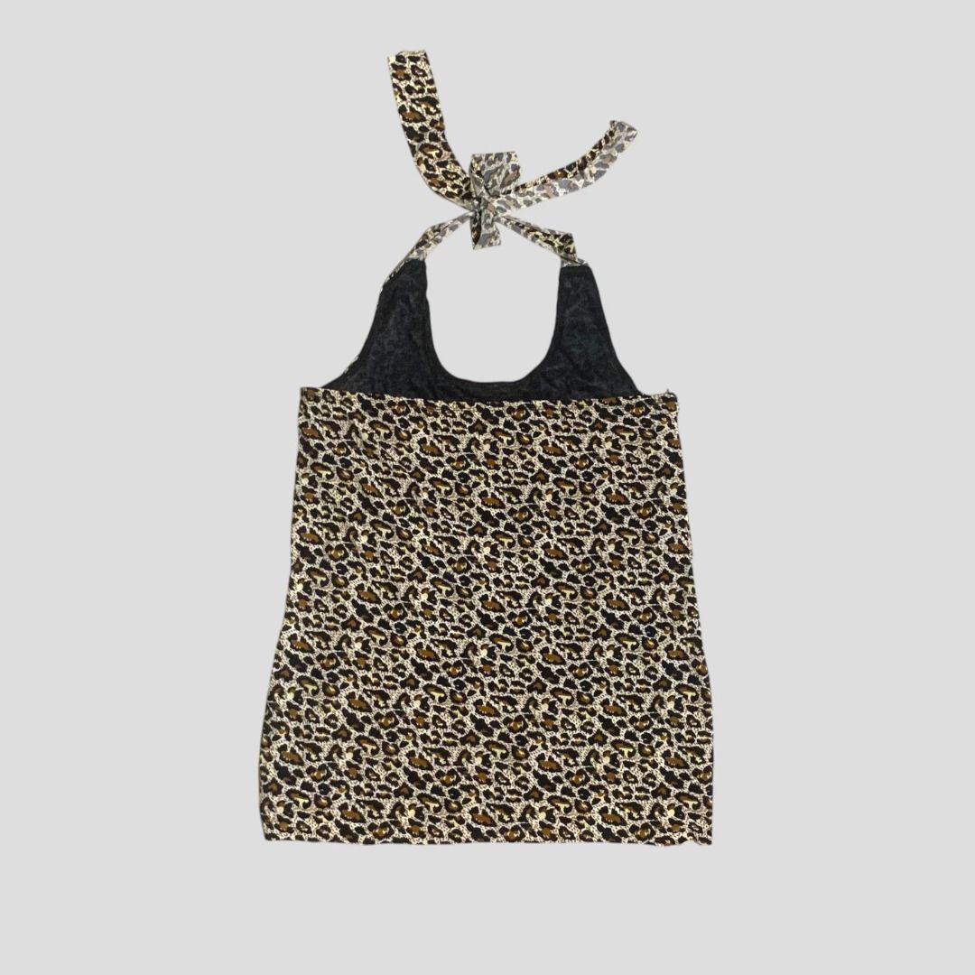 y2k leopard print tiered halter top gal (Category: Sleeveless) located in Arayat. Submitted by capymelon (Listing ID 1443416024, Image 2). Description: ⋆ ˚📏⋆｡˚ dimes is in the last photo ⋆ ˚📏⋆｡ note: minimal discrepancies in measurements may occur when sellers take garment dimes size : medium details : stretch issue : none color may vary due to lighting ( tap the photos to view them in full ) send me a message if interested! 📍pampanga sf range